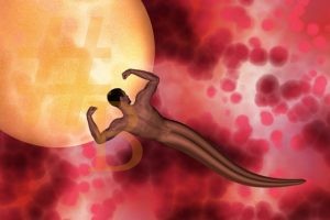 un homme spermatozoïde semble lutter contre un ovule